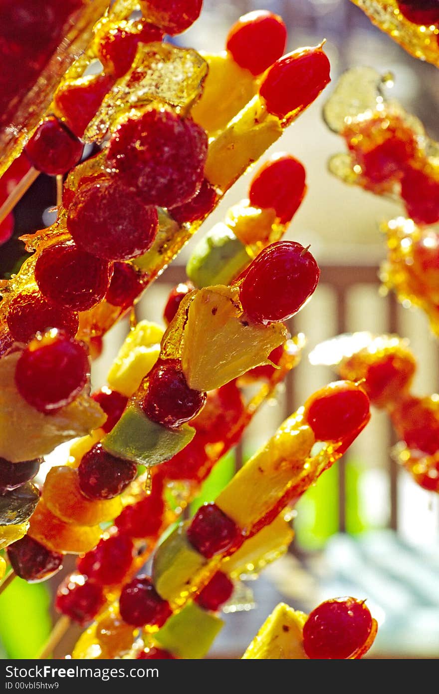 Strings of hawthornes and potatoes coated in sugar. Strings of hawthornes and potatoes coated in sugar