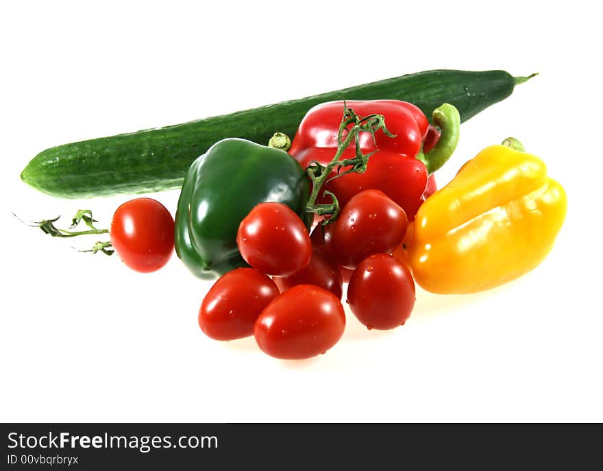 Isolated red, green and yellow fresh vegetables. Isolated red, green and yellow fresh vegetables