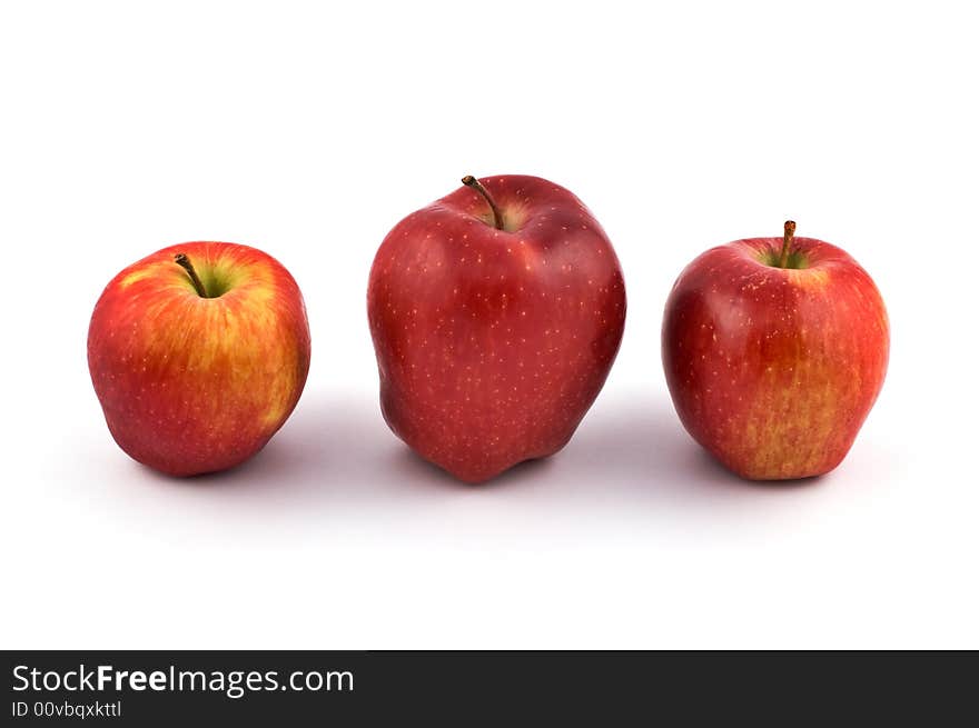 Three red apples