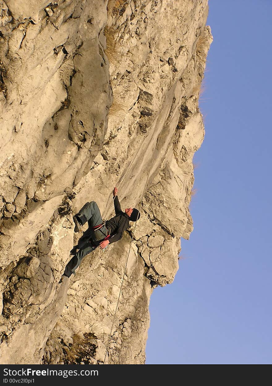 A male rock-climber on training