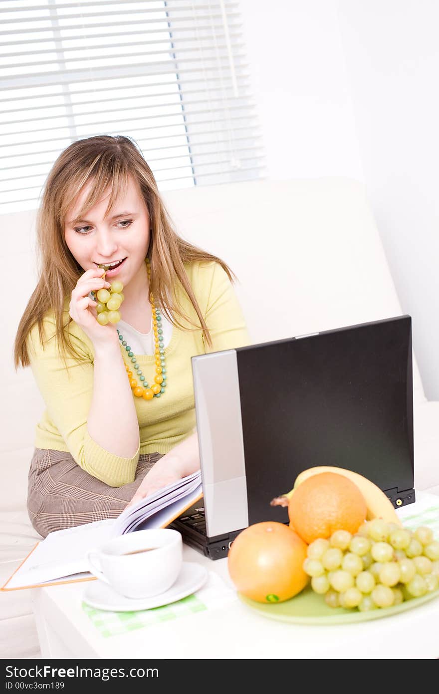 Portrait of beautiful woman with laptop / at home