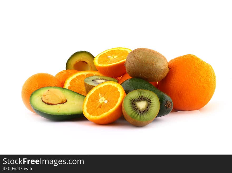 Fresh avocados with other fruits  isolated on white background