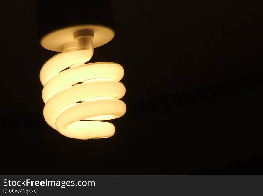 Ecological light bulb isolated on black. Ecological light bulb isolated on black