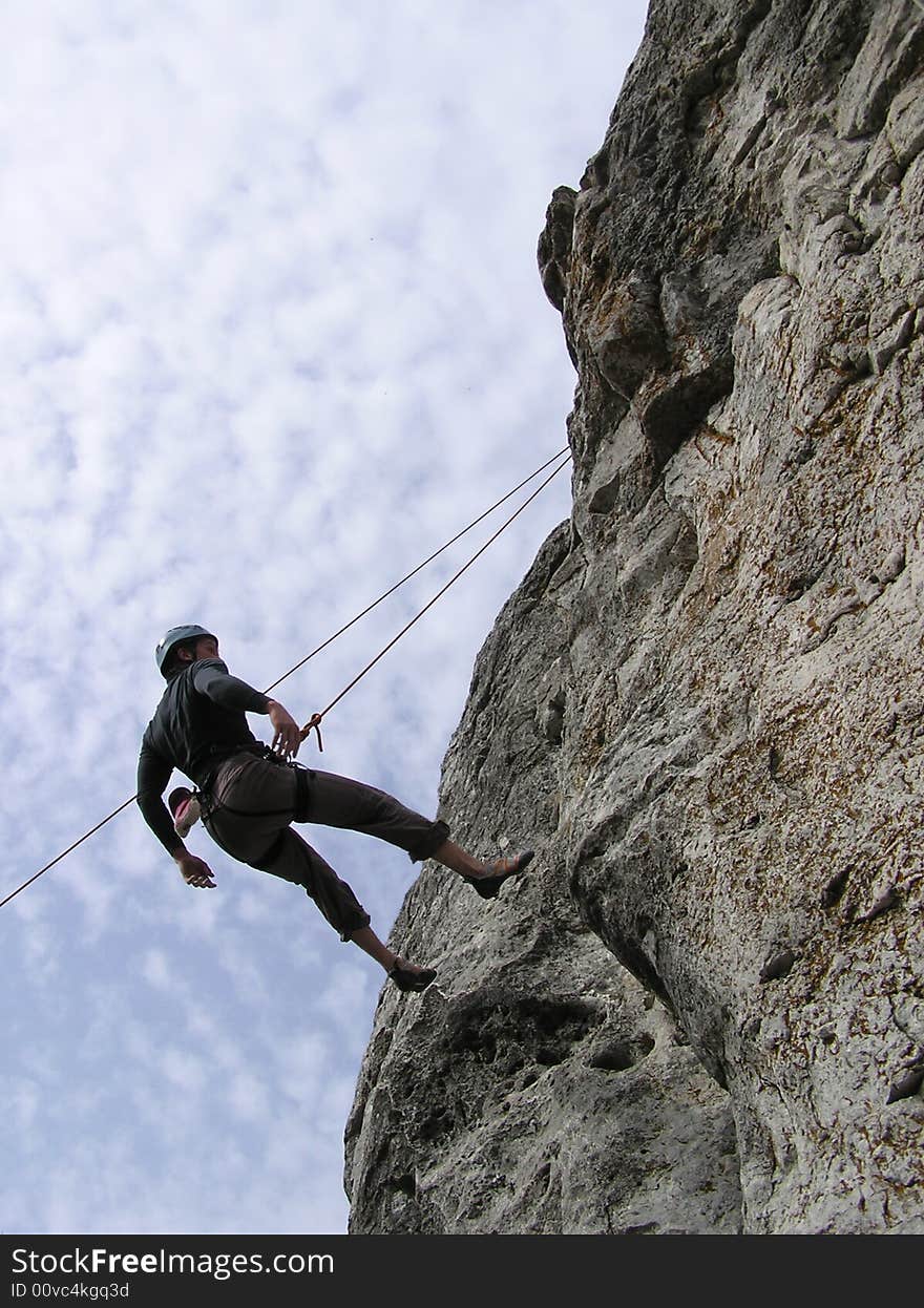 A male rock-climber on training