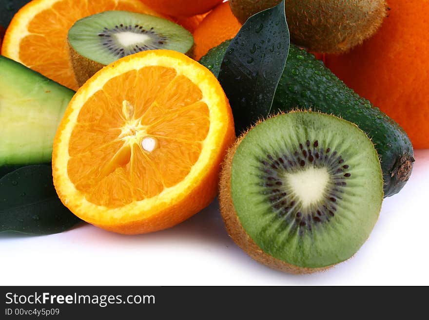 Fresh avocados with other fruits  isolated on white background