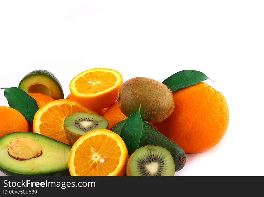 Fresh avocados with other fruits  isolated on white background