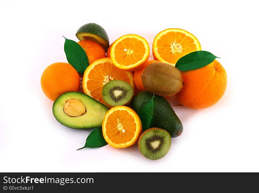 Fresh avocados with other fruits  isolated on white background