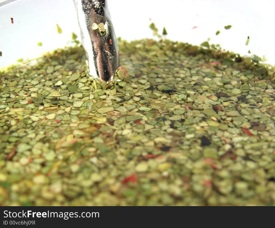 White glass cup with fresh green mate tea. White glass cup with fresh green mate tea