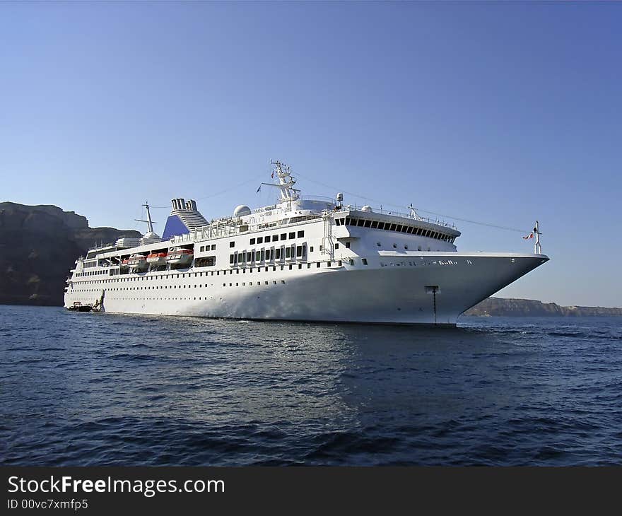 White cruiseship navigating in greek waters. White cruiseship navigating in greek waters