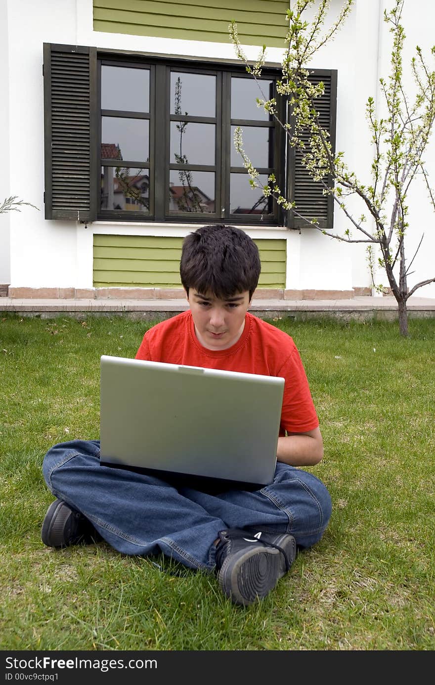 Young Man And Laptop