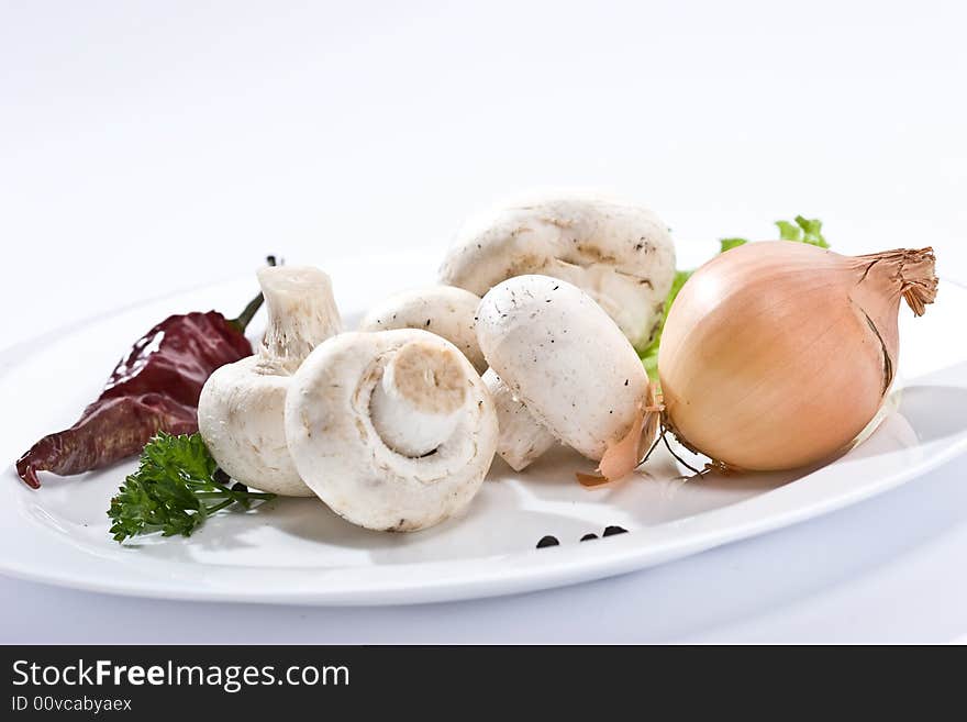 Food series: some mushrooms on the white plate