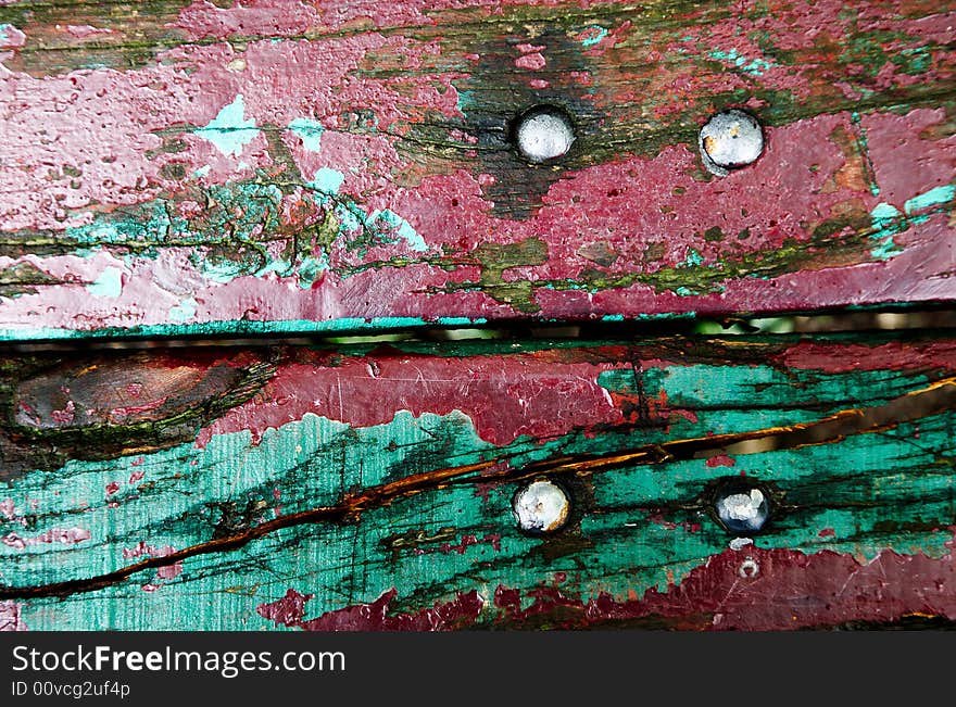 Colourful detail of a old grungy bench. Colourful detail of a old grungy bench