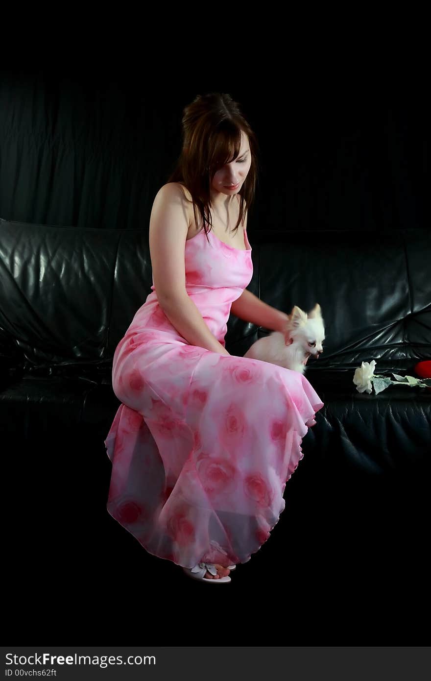 Pretty, young woman with a white dog. Pretty, young woman with a white dog.