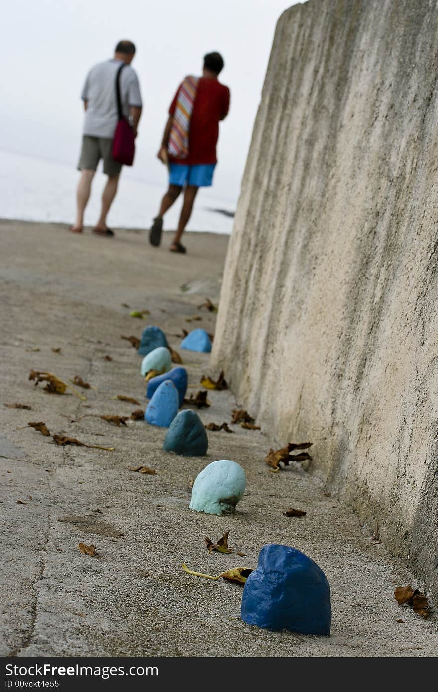 Two Men And Blue Stones