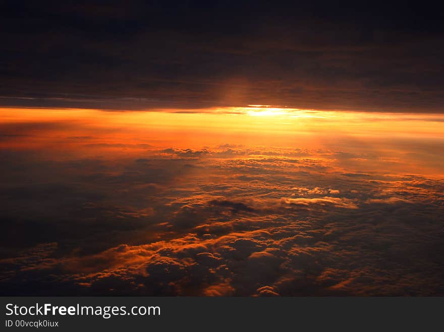 The colorful clouds and dazzling sunbeam in the sunset. The colorful clouds and dazzling sunbeam in the sunset.