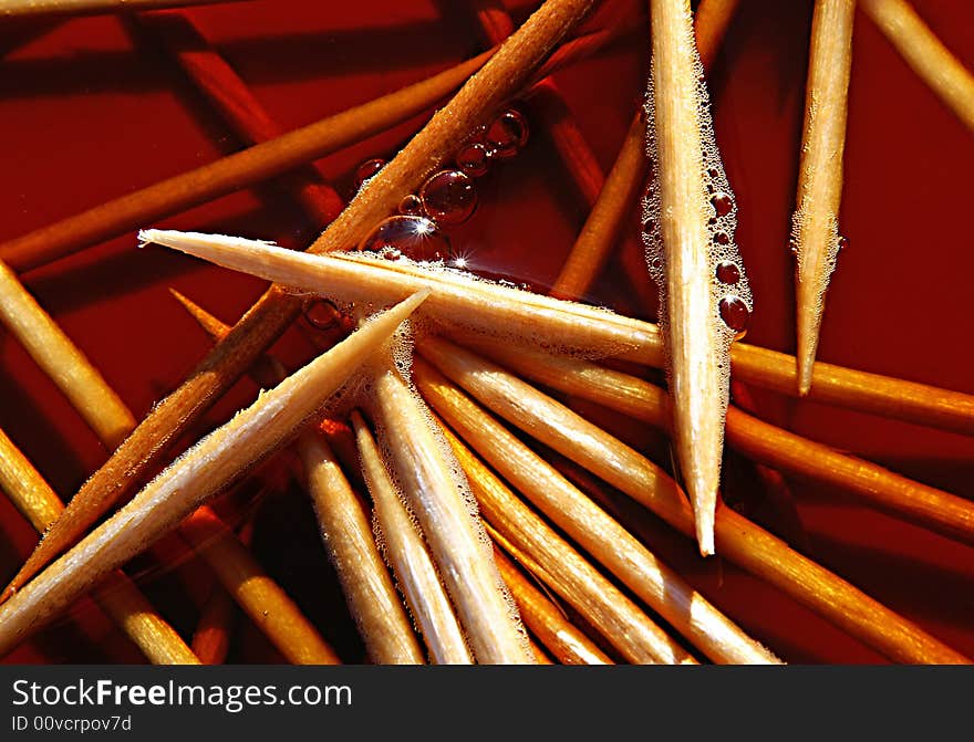 An abstract close-up photograph of pointy toothpicks. Suggests chaos.