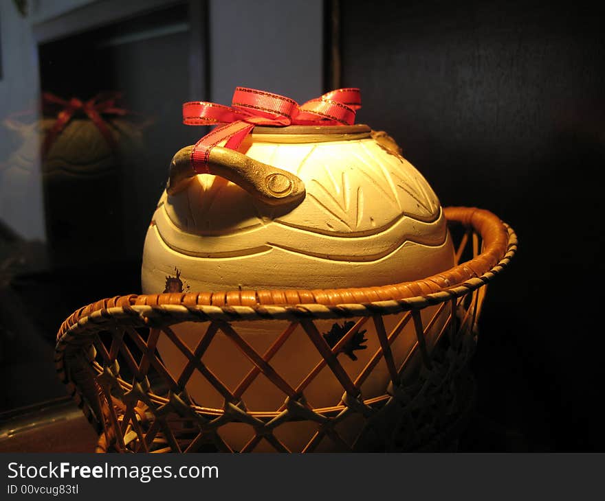 A decoration with a pot in a basket