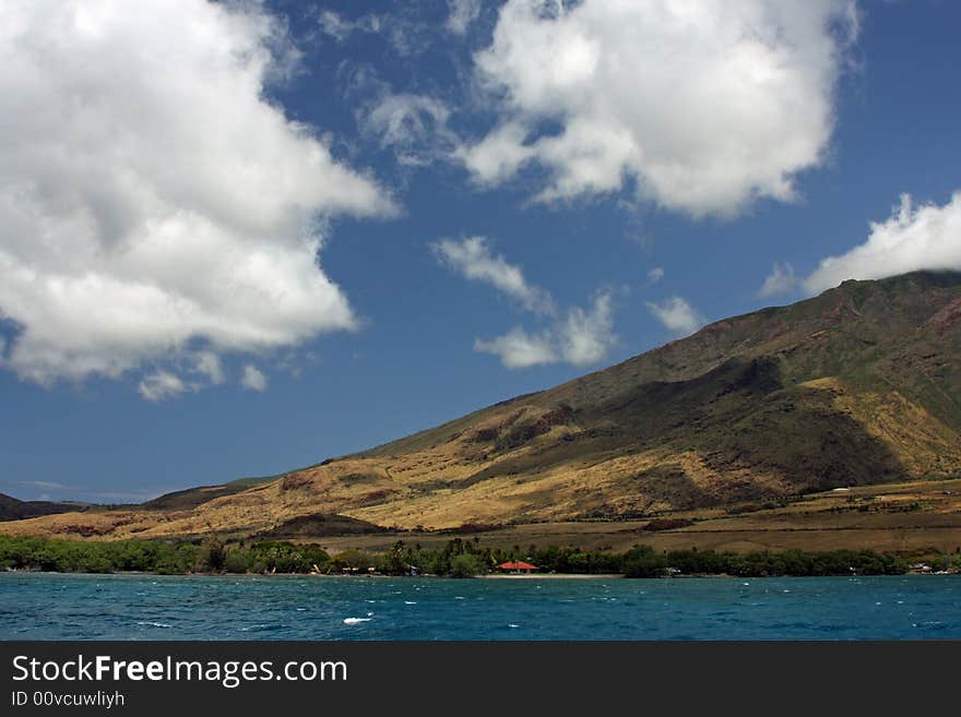 Taken from a boat on the ocean in Maui looking at the landscape. Taken from a boat on the ocean in Maui looking at the landscape.