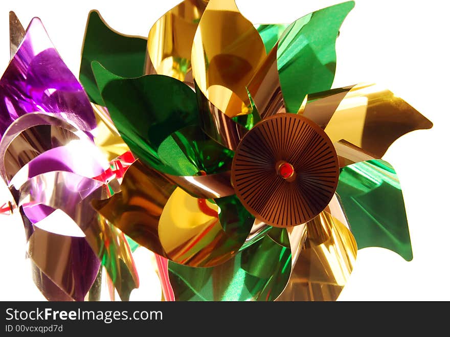 Pinwheels of bright colors made of metallic plastic