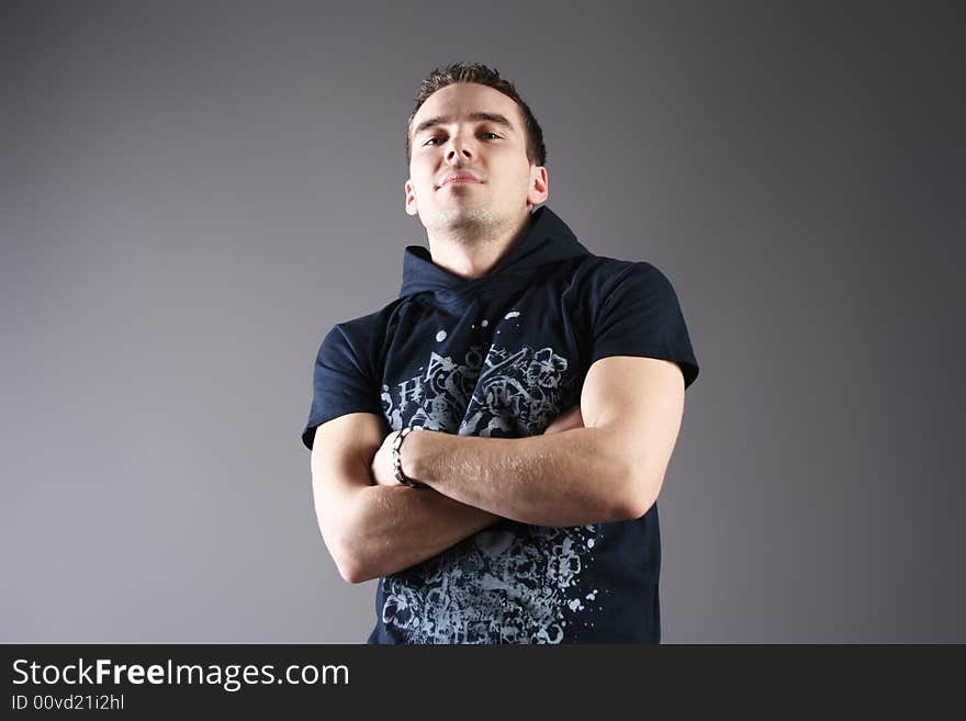 Young guy on darken background