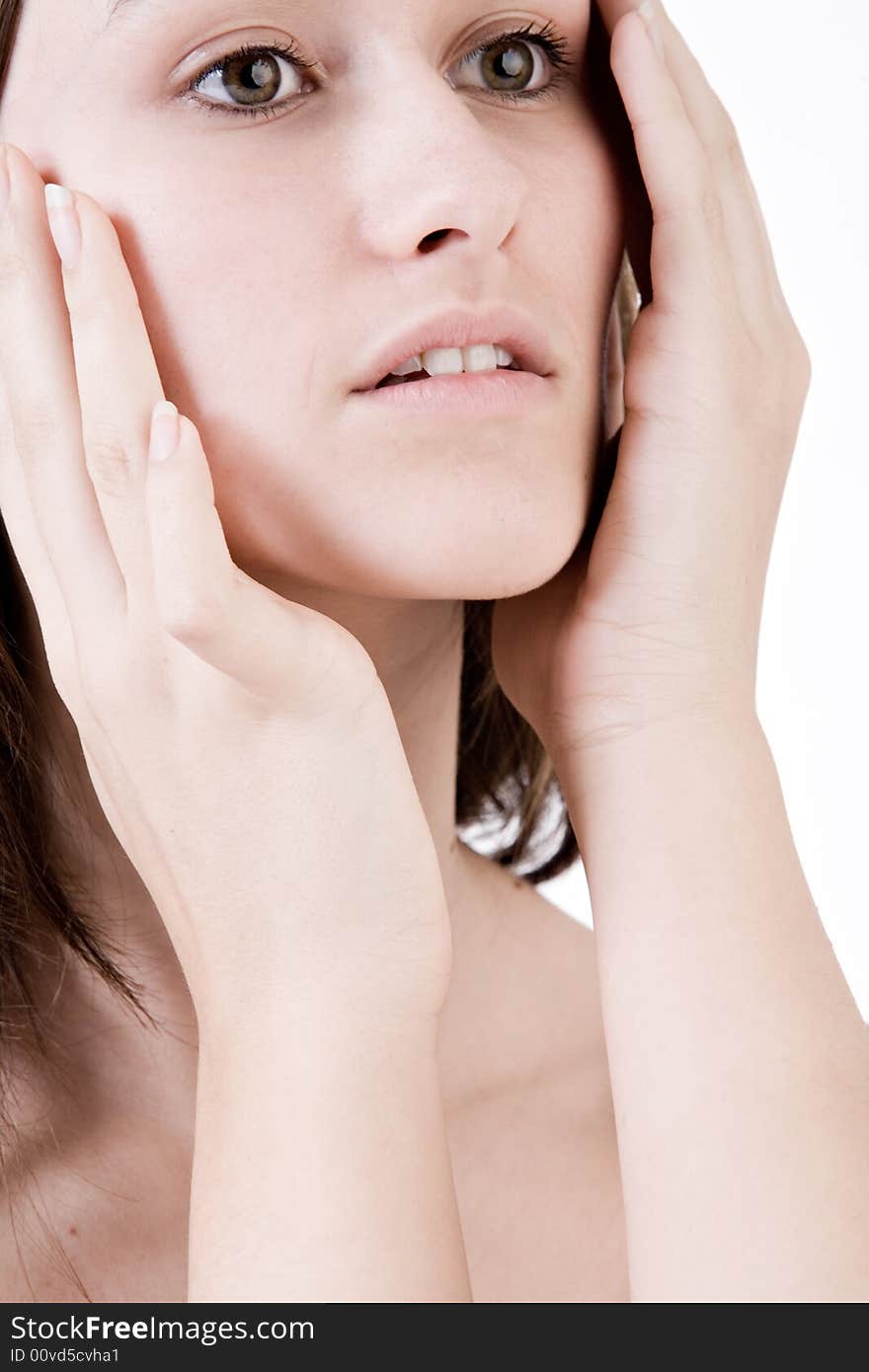 Young woman portrait in the studio on a white background. Young woman portrait in the studio on a white background