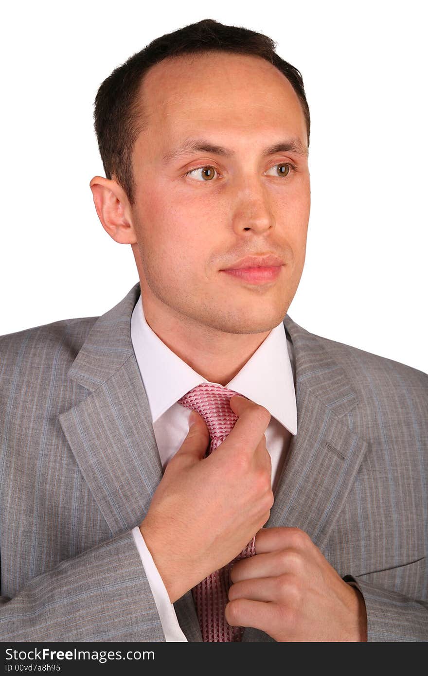 Young Businessman Corrects  Necktie