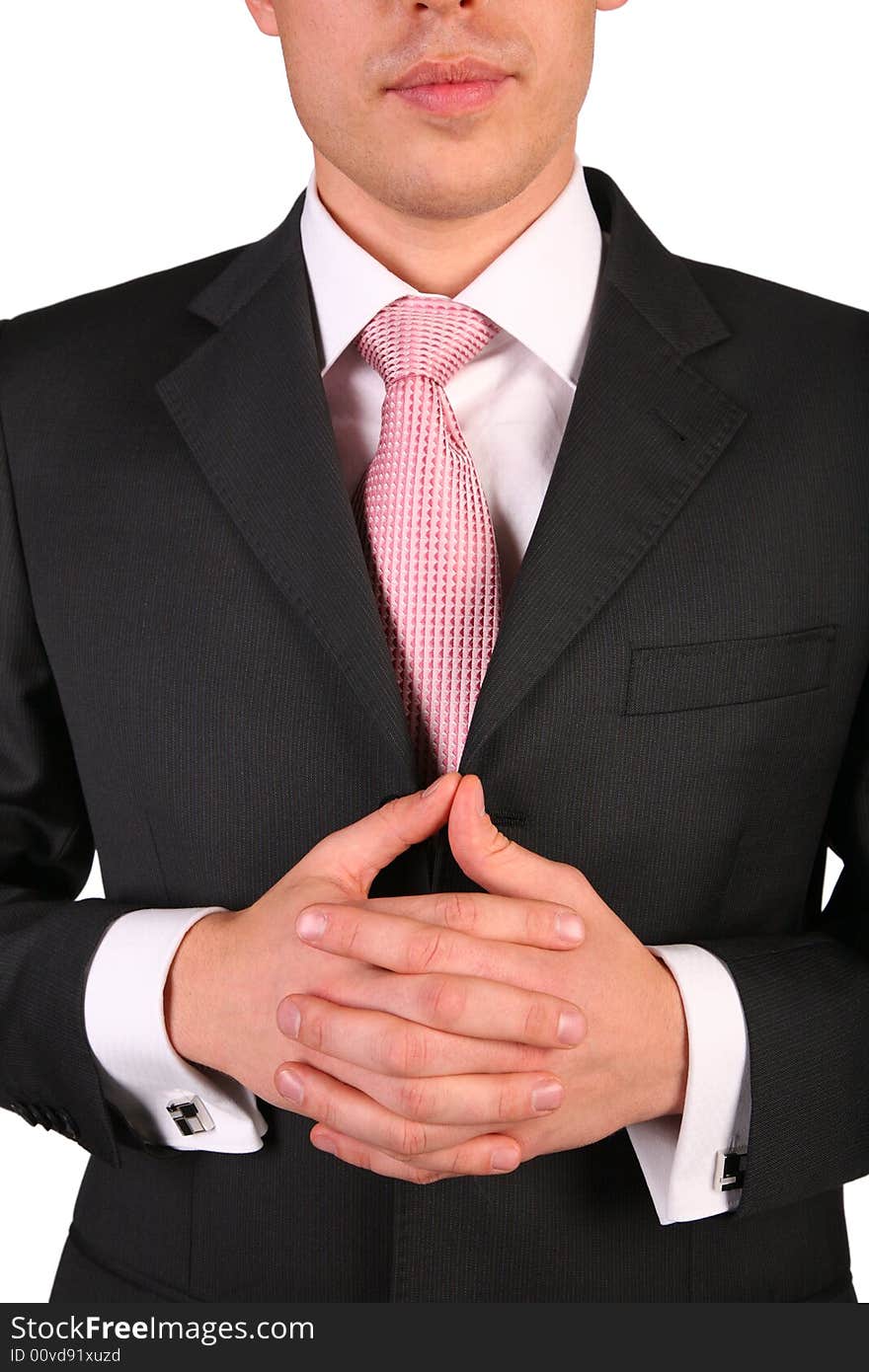 Young businessman with folded hands