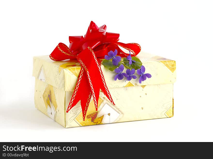 Holiday box with the tape and the blue flowers