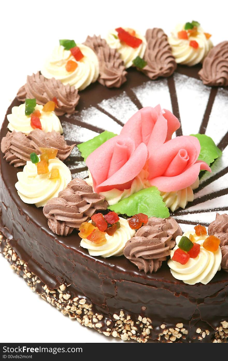 Chocolate cake with pink roses decoration.