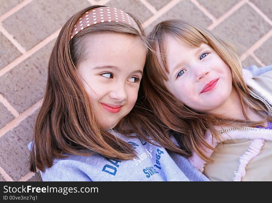 Two young girls spending time together. Two young girls spending time together