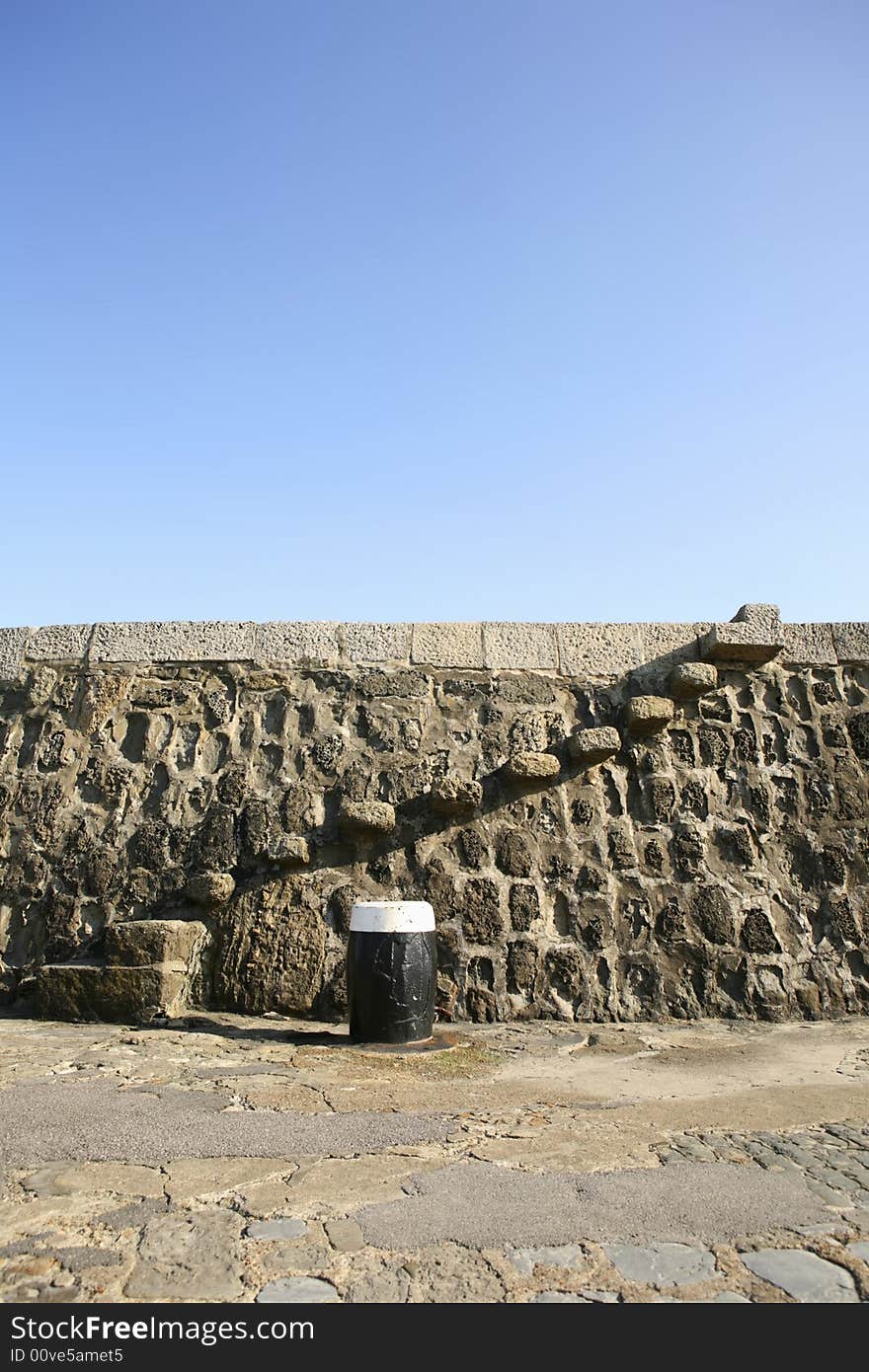 Old stone steps on a harbor, concept moving upward, copy space.