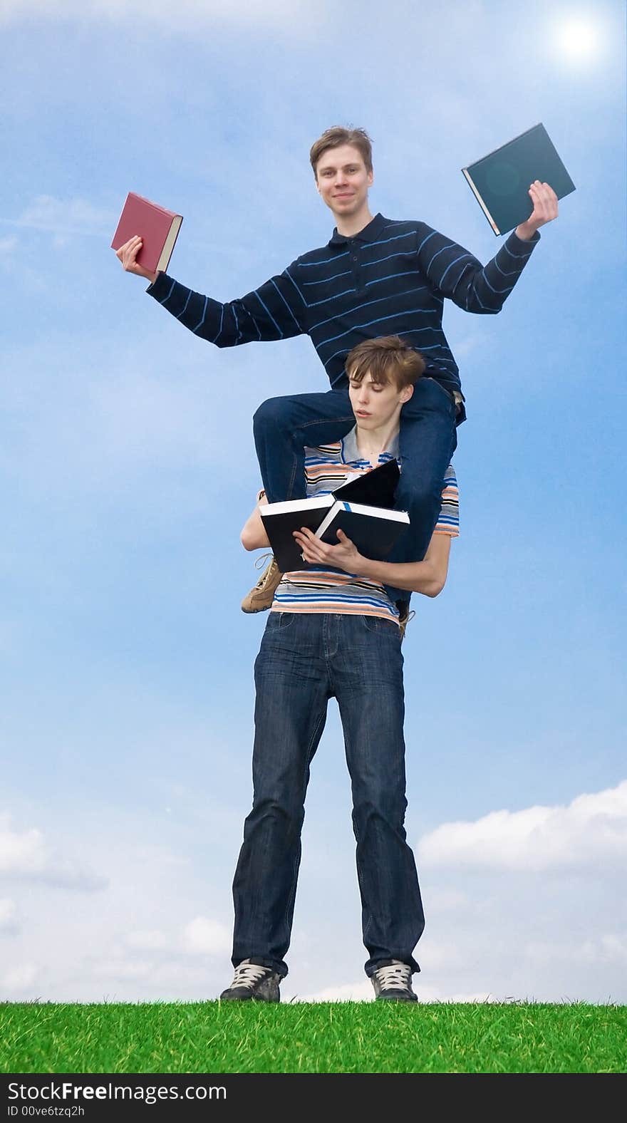 The two young students with the book. The two young students with the book