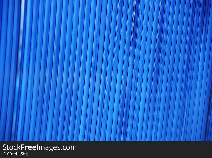 Blue abstract background -water runs on blue gass - sort focus. Blue abstract background -water runs on blue gass - sort focus