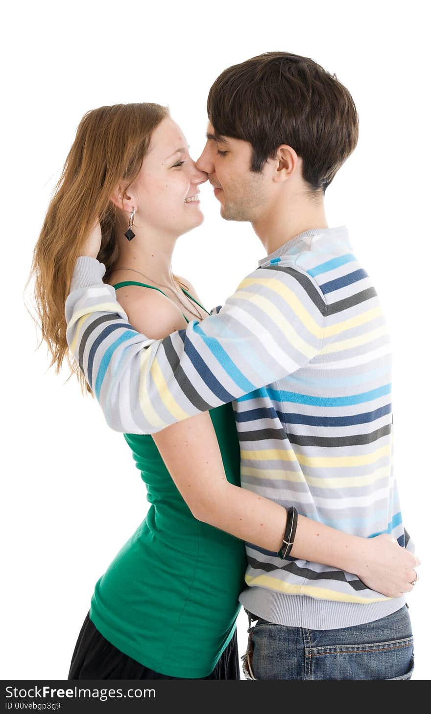 The young flirting couple isolated on a white background