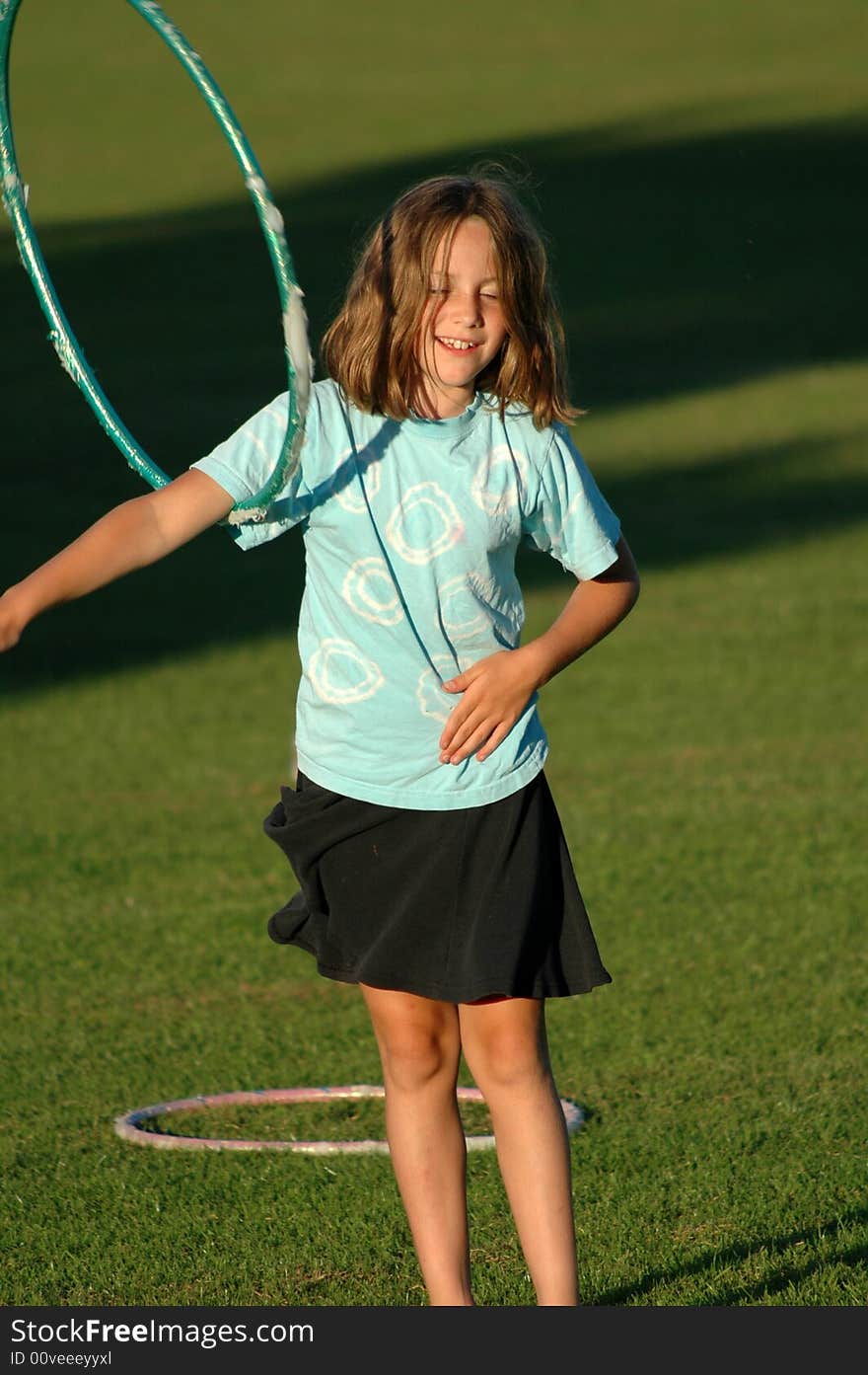 Girl with hula-hoop