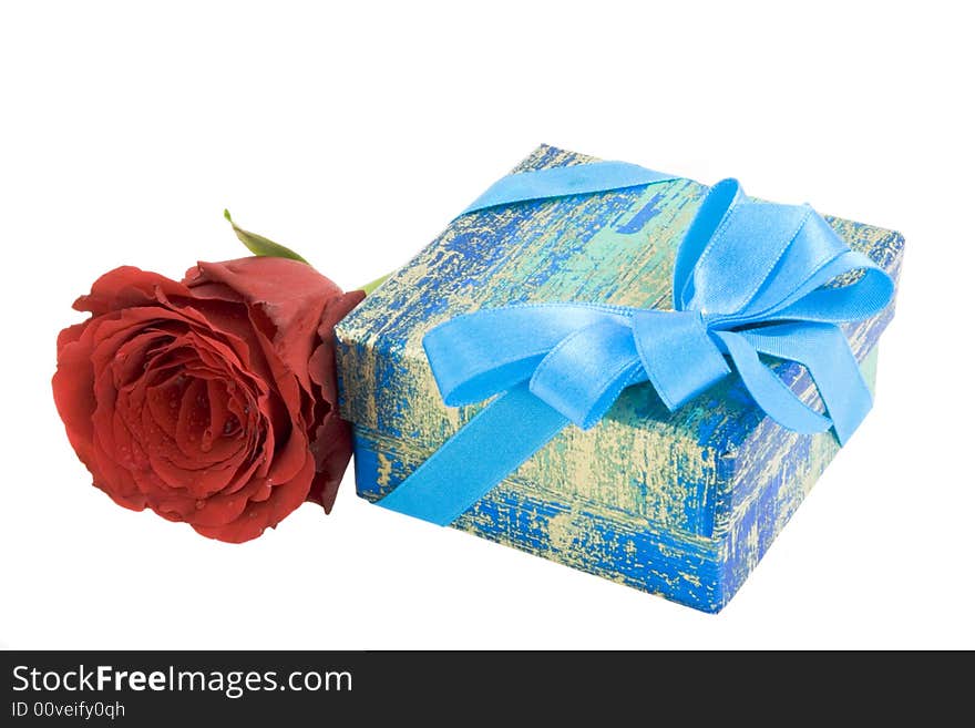 Gift box with ribbon and red rose isolated on white