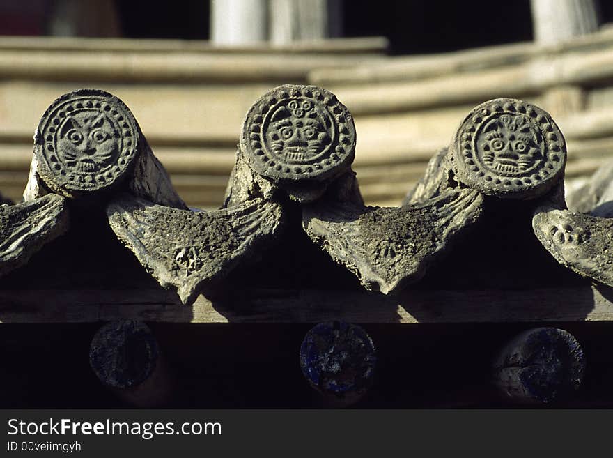 Tiles with tiger designs on it, traditional architecture, china