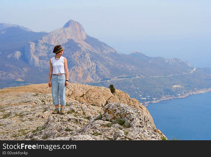 Girl on the top of mountain