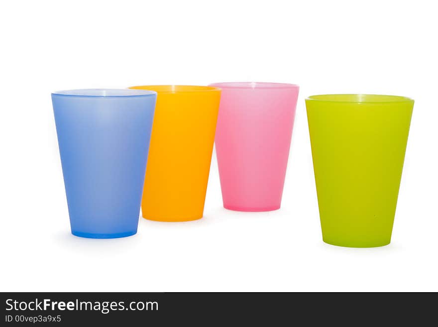 Color plastic glasses on a white background