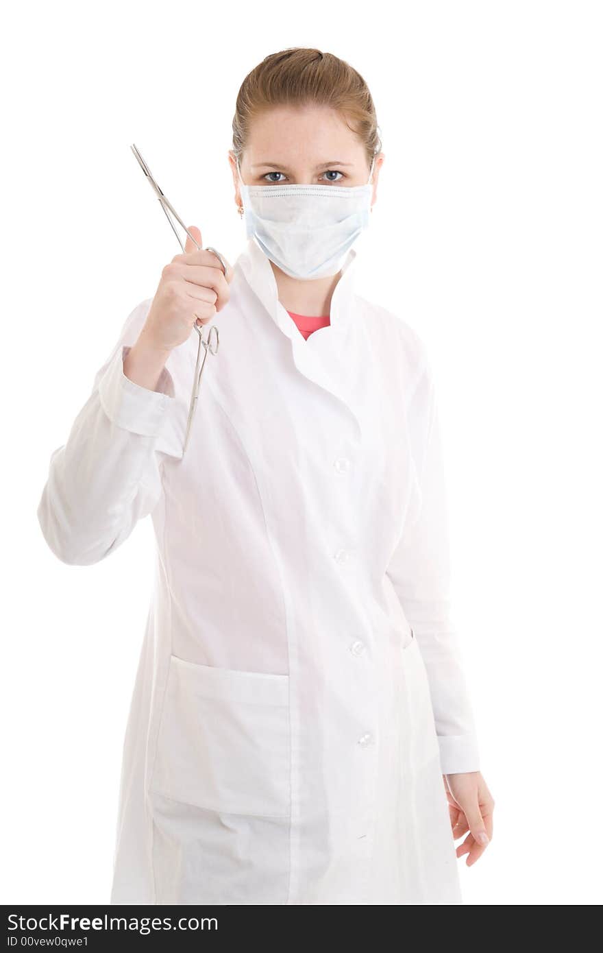 The young nurse with scissors isolated on a white background