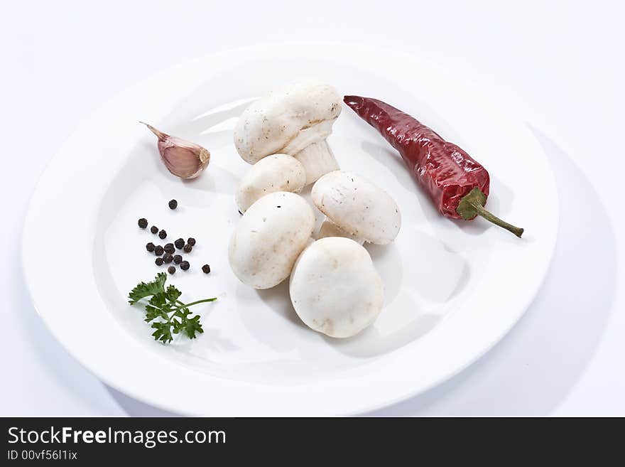 Food series: some mushrooms on the white plate