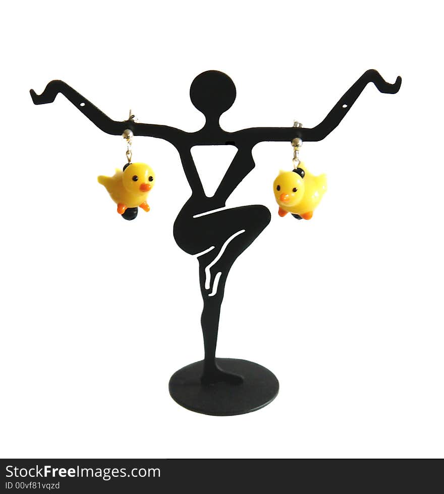 Ducky earrings on a display stand