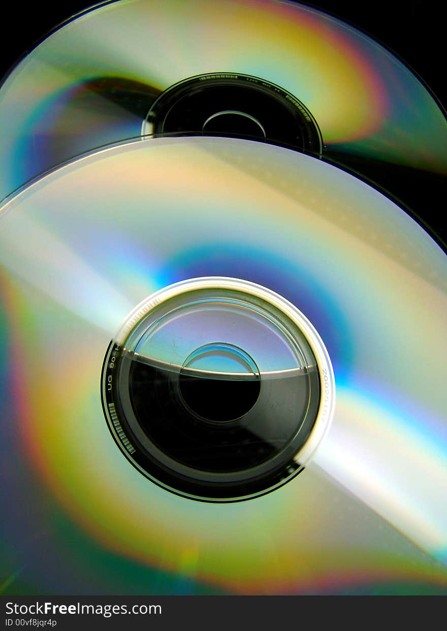 Two bright and colorful blank CD’s. Two bright and colorful blank CD’s