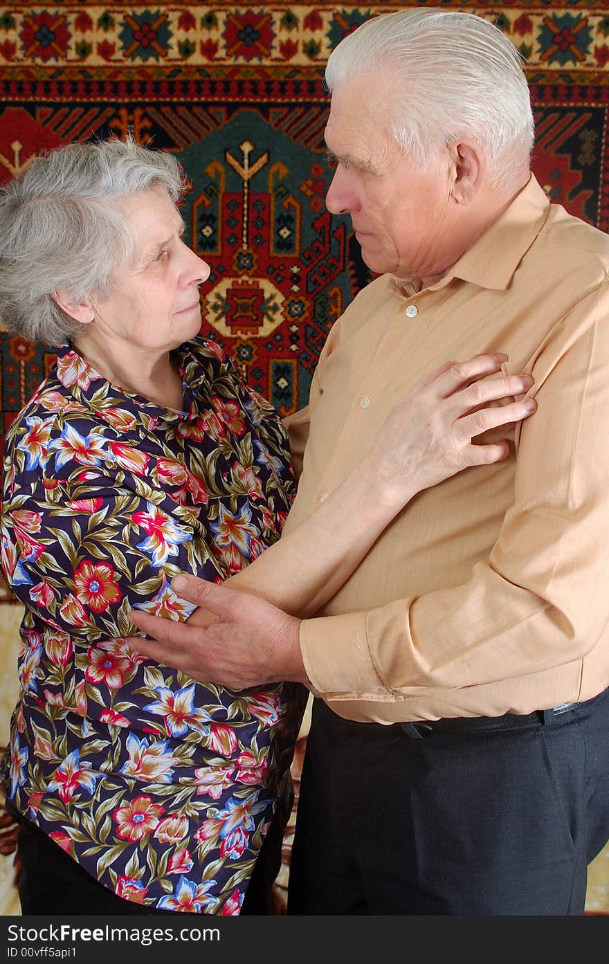 Dancing senior couple at home