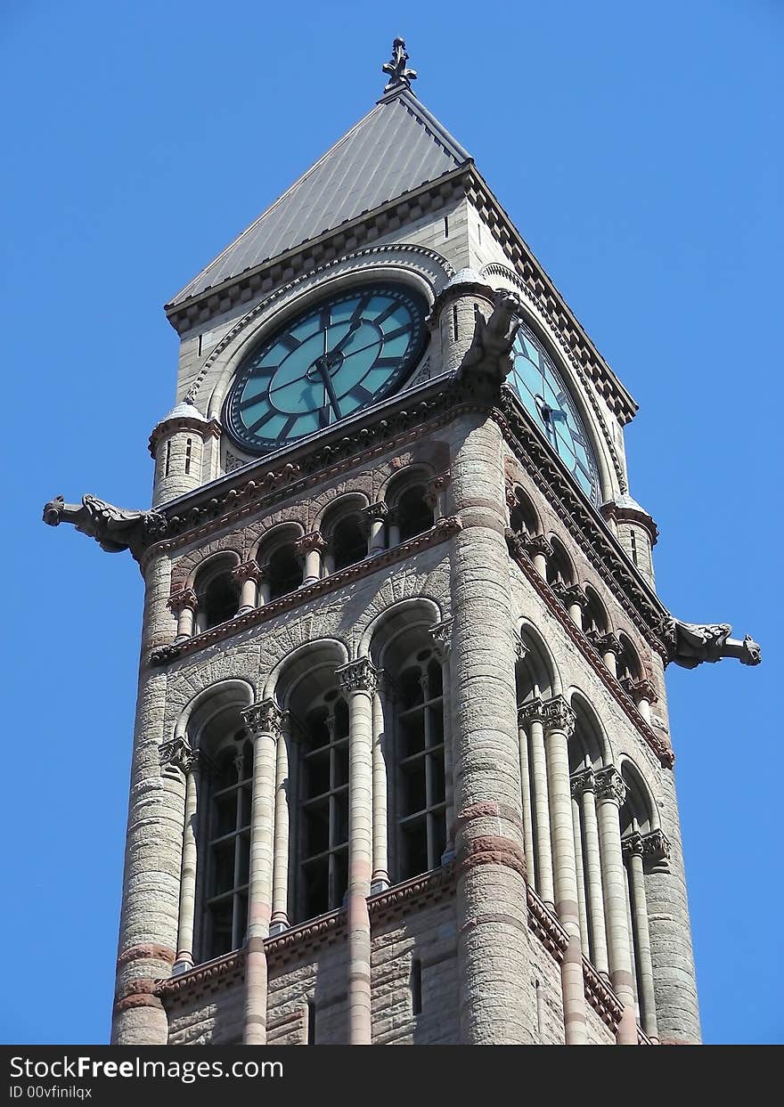 Gargoyles on the clock tower of Old City Hall, Toronto, Canada.