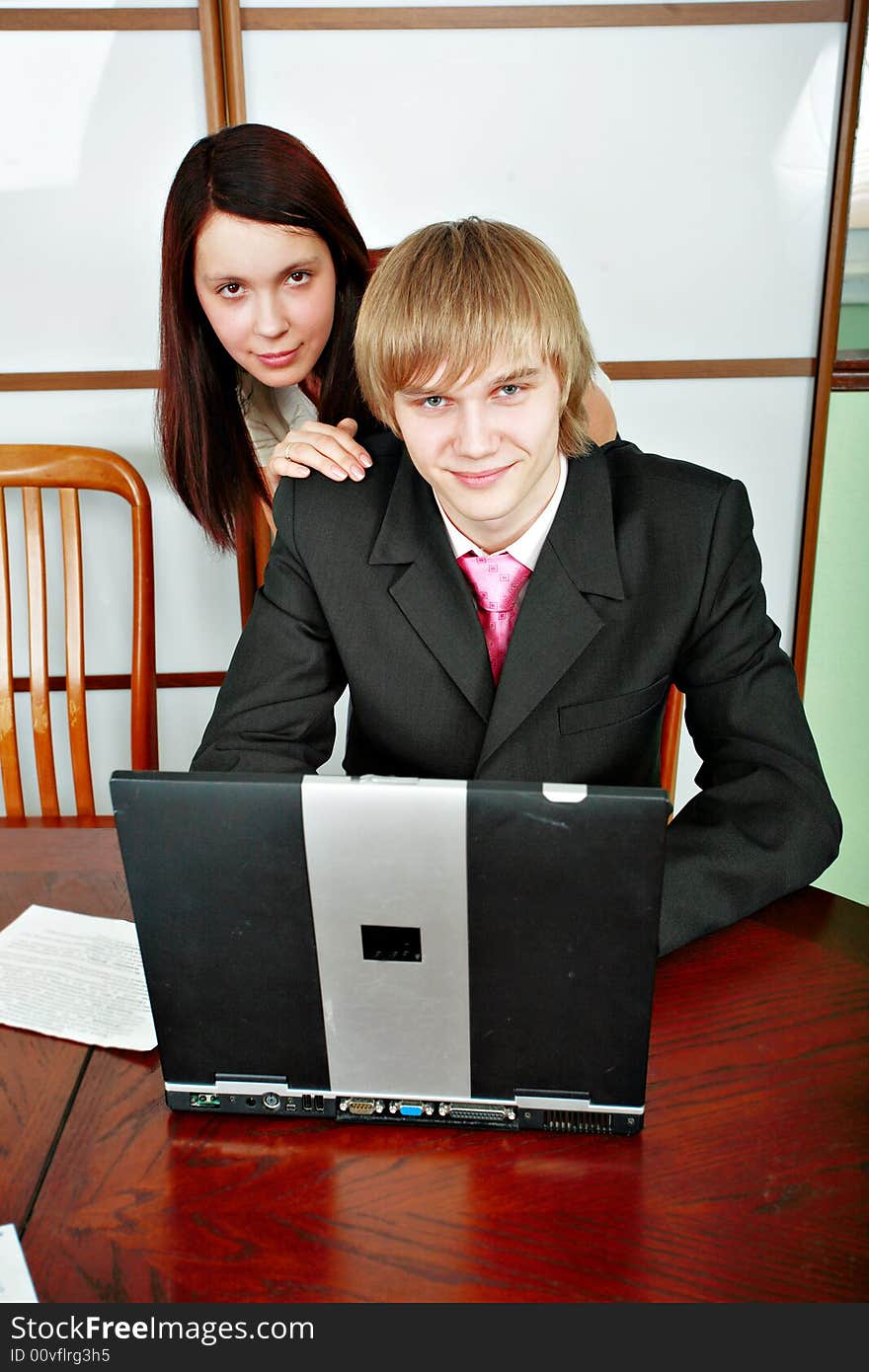 Group of business people working together in the office. Group of business people working together in the office.