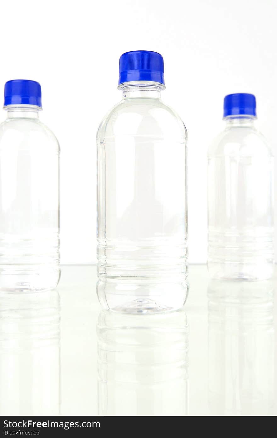 Bottled water isolated against a white background