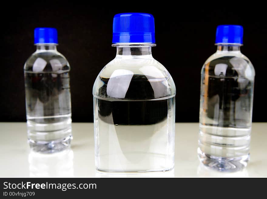 Bottled water isolated against a white background