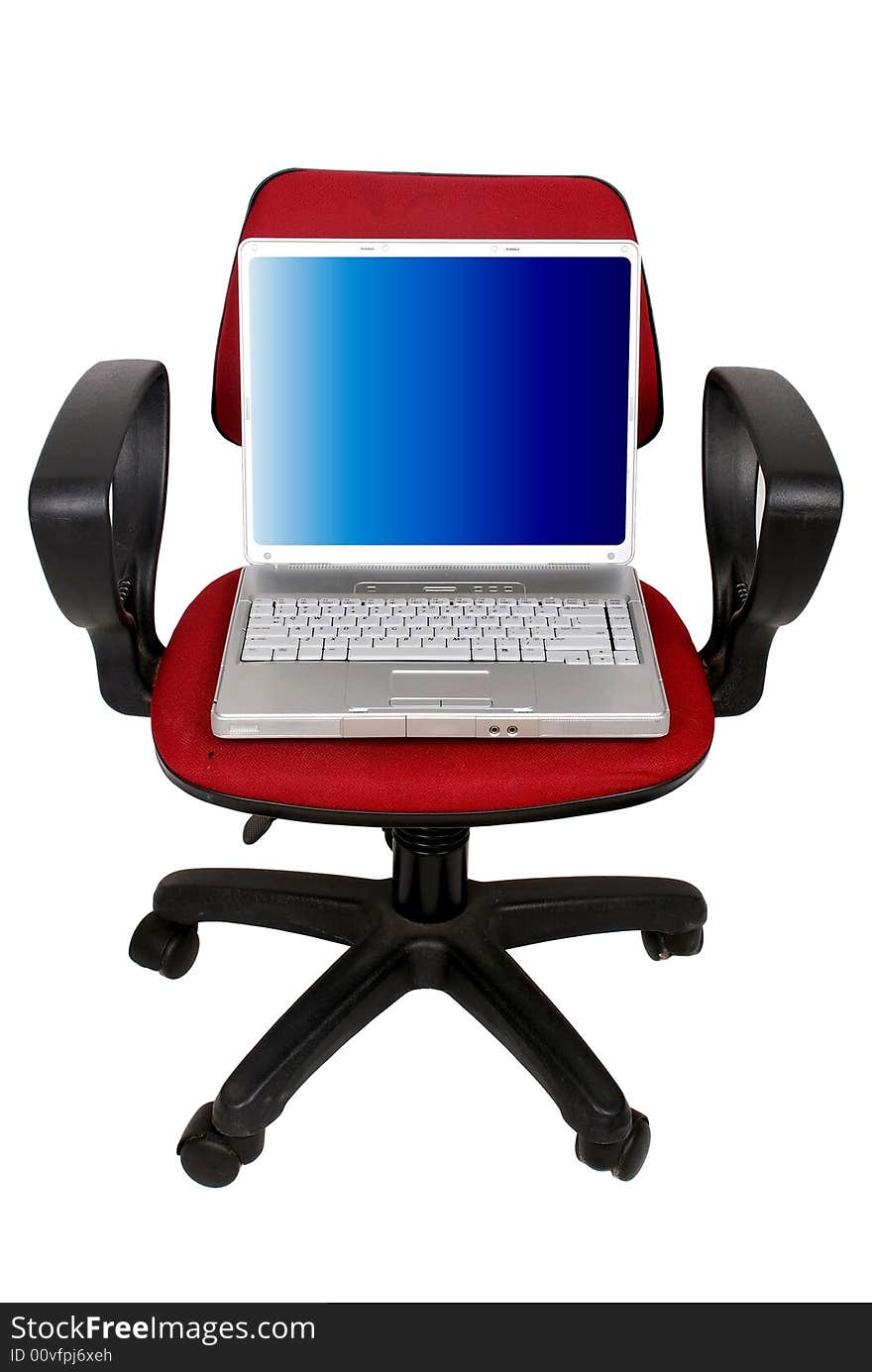 Laptop computer on the red chair over white