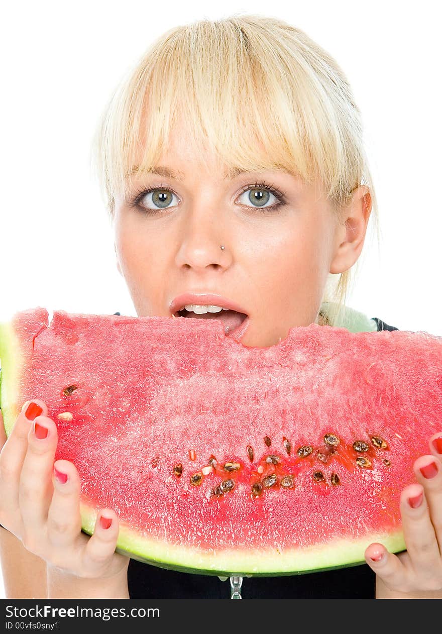 Beautiful green-eyes blondy eating sweet water-melon. Beautiful green-eyes blondy eating sweet water-melon